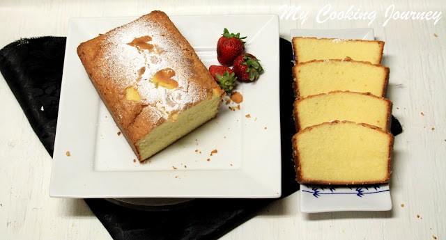 Vanilla Pound Cake served with strawberries in a white dish