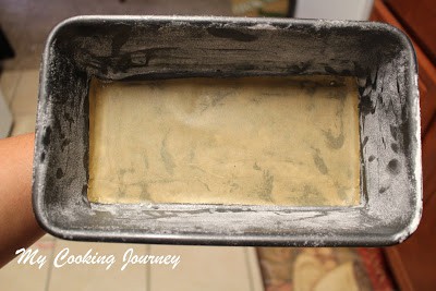 Greasing pound cake tin