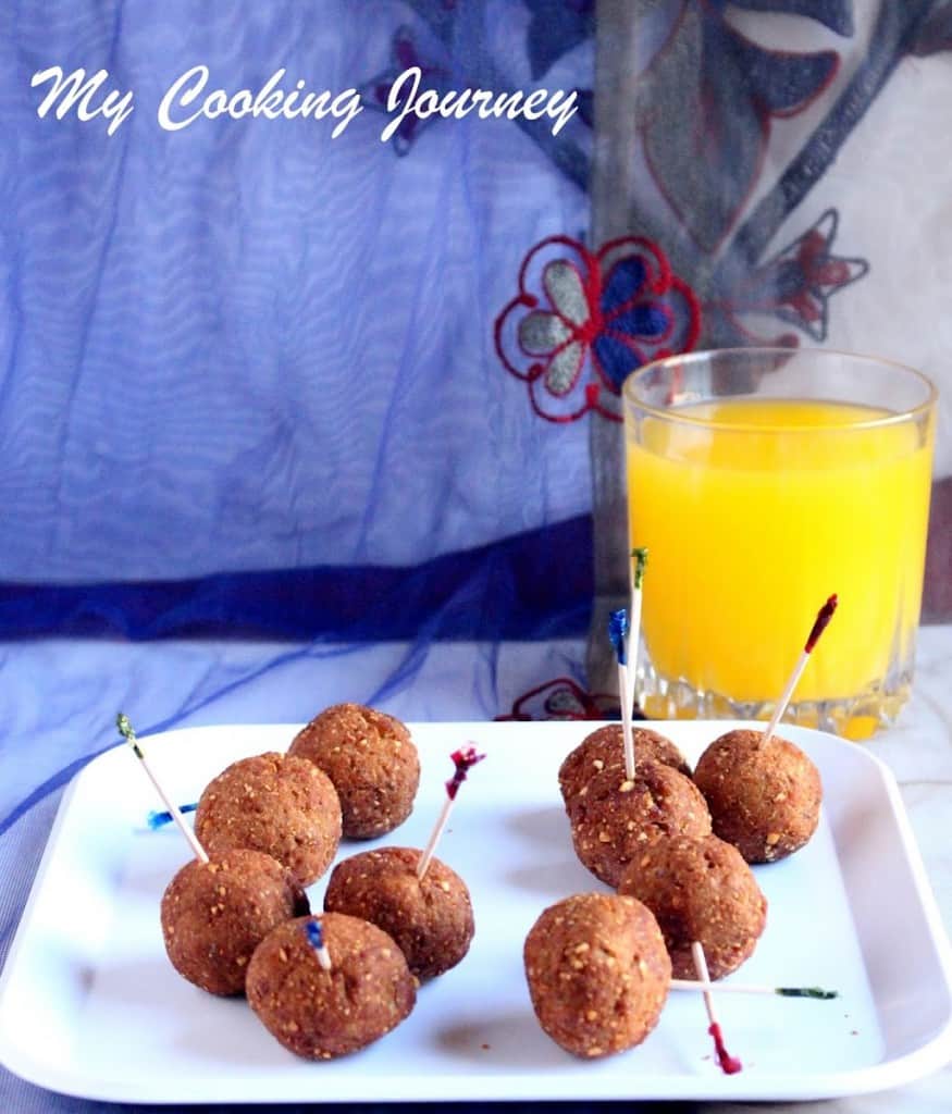 Vaazhakkai Kola Urundai – Raw Banana Fried Balls with orange juice