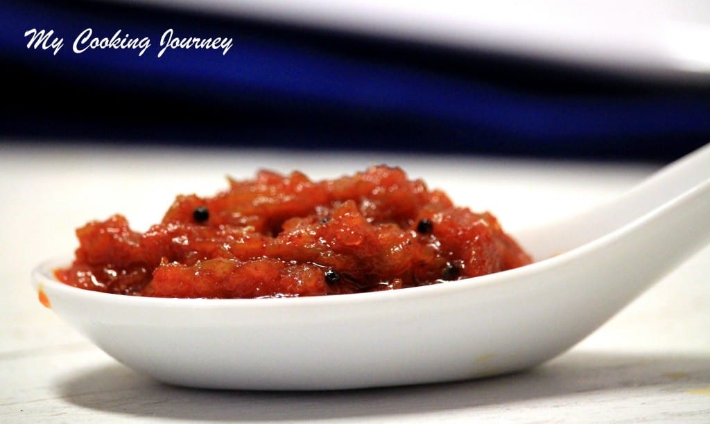 Mango Thokku in a spoon