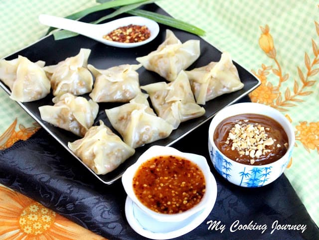 Thai sweet chili sauce and peanut sauce with vegetable dumplings