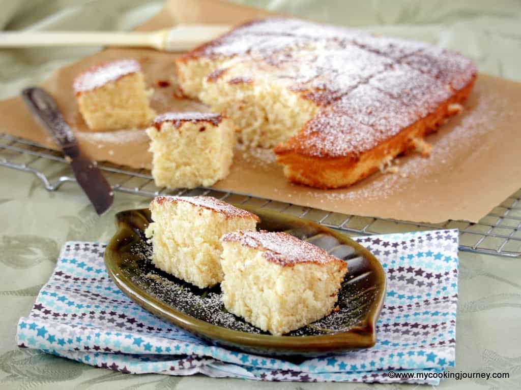 Sliced Hot Milk Cake with rest in cooling rack
