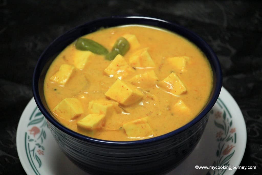 Dahi Paneer served in a bowl with plate