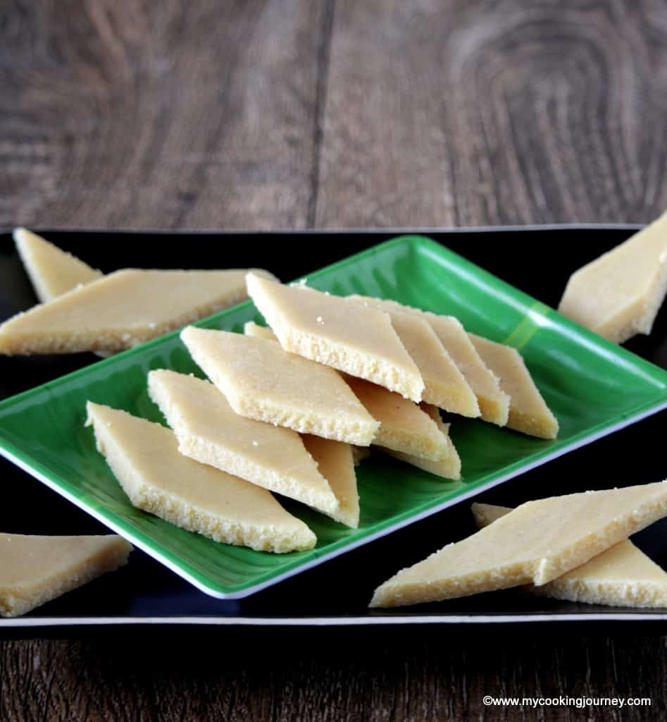 Badam Burfi side image on a green plate