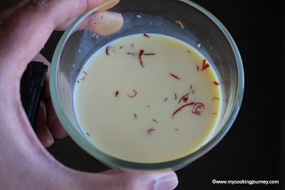 Saffron strands soaking in milk