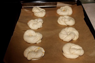 Resting the dough to rise in a tray.