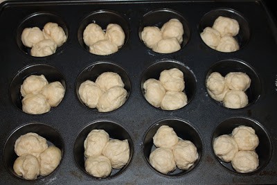 Adding Dough in a cupcake tin