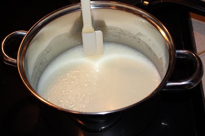 Mixing milk in a pot