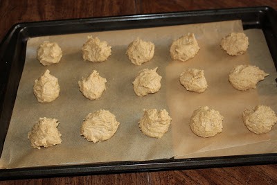 cookie dough placed in a baking tray lined with parchment