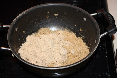 brown sugar, almond powder and cardamom powder added to ground roti mixture