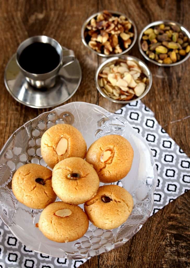 Serve Sekerpare with tea and dry fruits