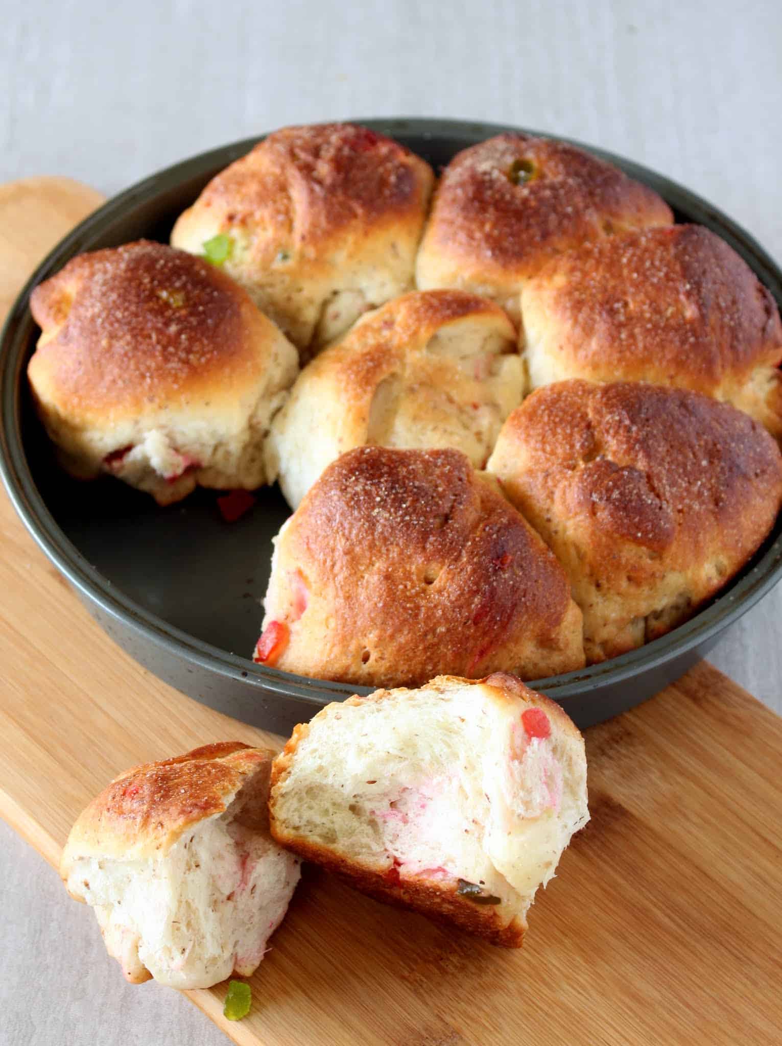 Pull apart Sweet buns in baking tray and on a board