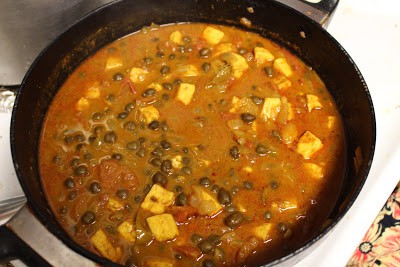 Simmer and stir paneer pieces