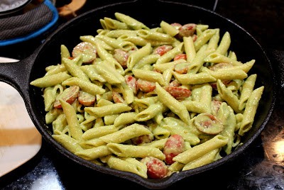 Combine the pasta in oven with cherry tomatoes and pesto.