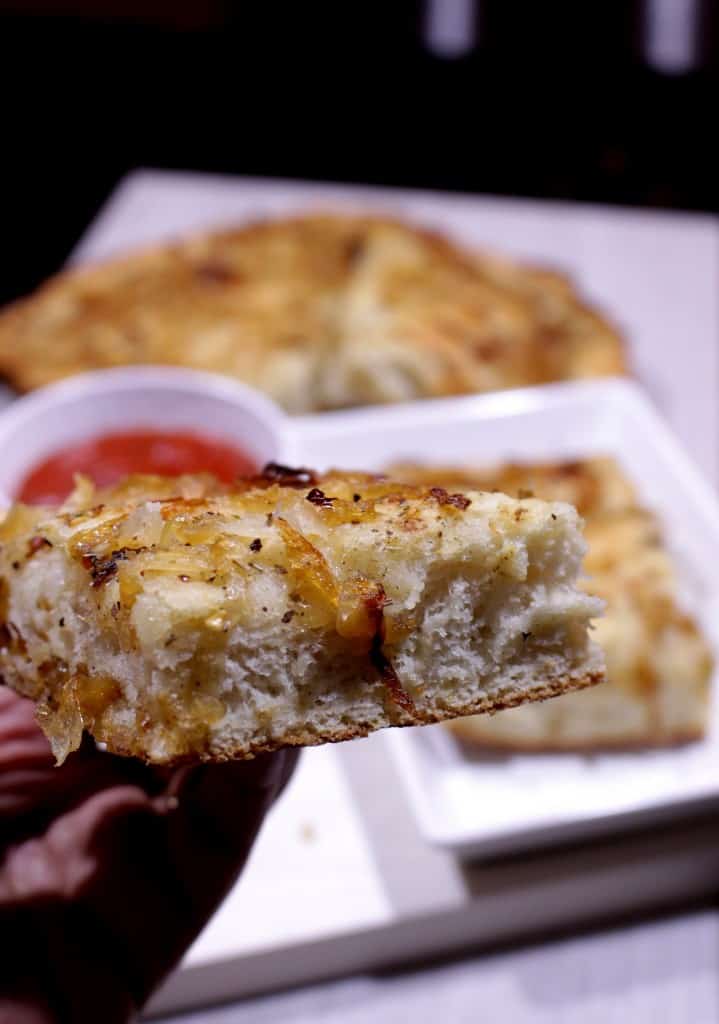 Focaccia with Herbed Oil and Caramelized Onions in piece