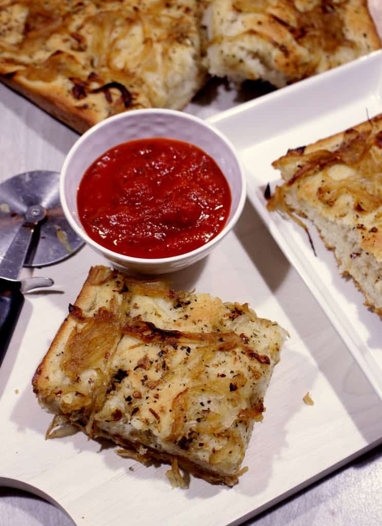 Focaccia with Herbed Oil and Caramelized Onions in plate