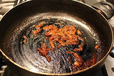 cooking the sauce in a pan