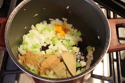 Sauteing onion and celery with spices for soup
