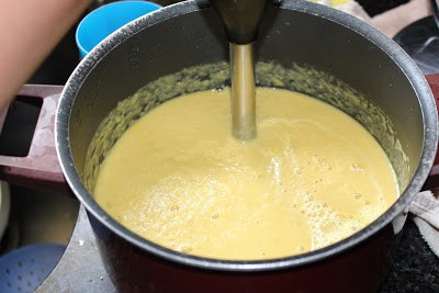 Blending the garbanzo beans with hand blender