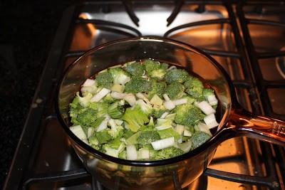 Boiling vegetables in a pot.
