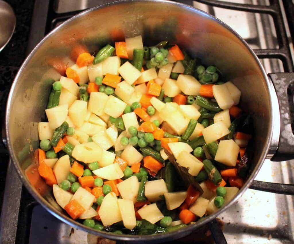 mixed vegetables sauteed in a pot