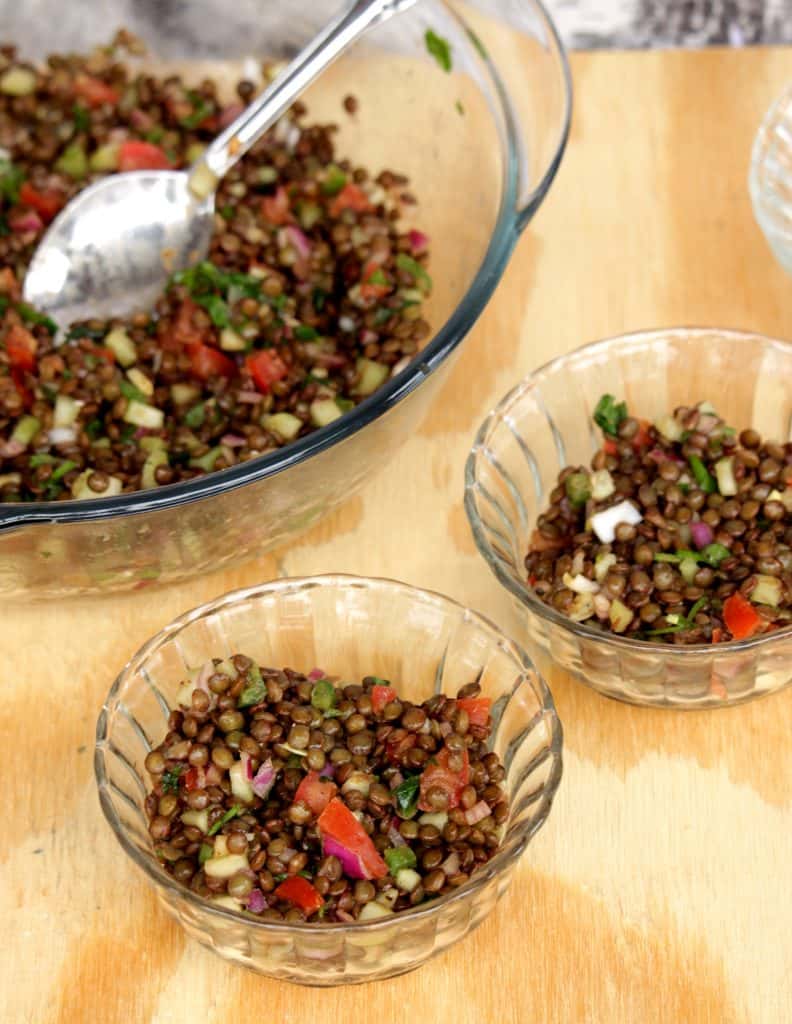 French Green Lentil Salad with Balsamic Vinegar Dressing in two small glass bowls