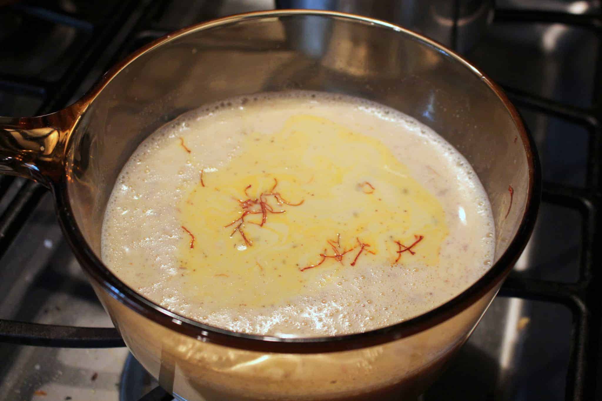 Milk boiling with saffron