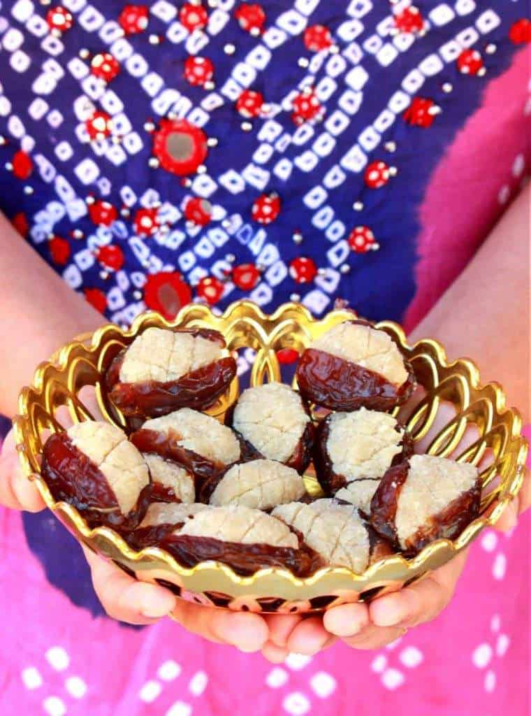 Dates stuffed with almond paste in a bowl