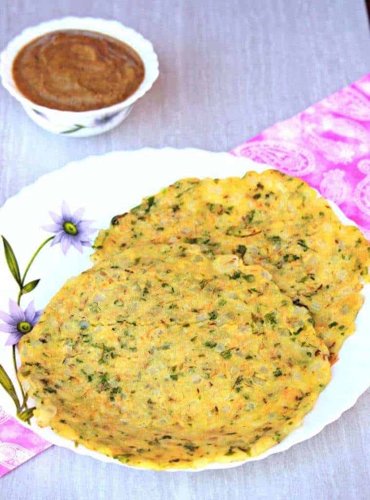 Karnataka rice flour roti in a plate with chutney in the background