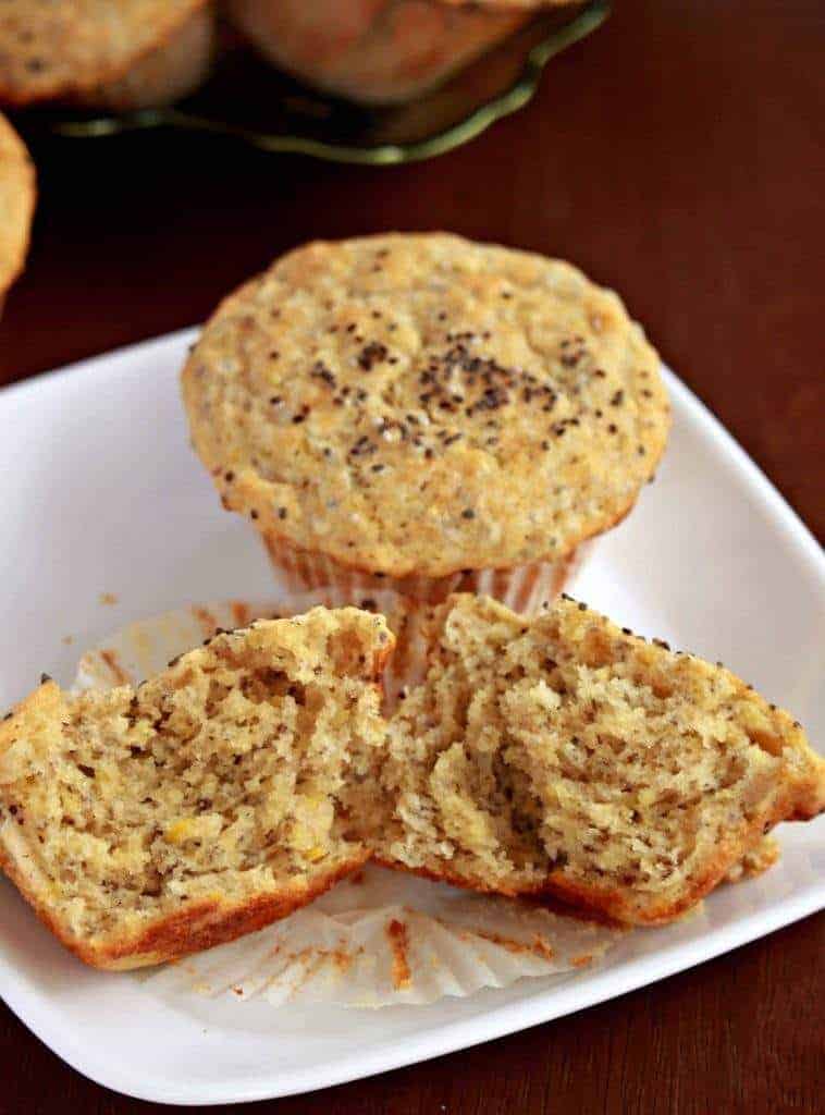 Lemon Chia Seed Muffins in white plate with split view