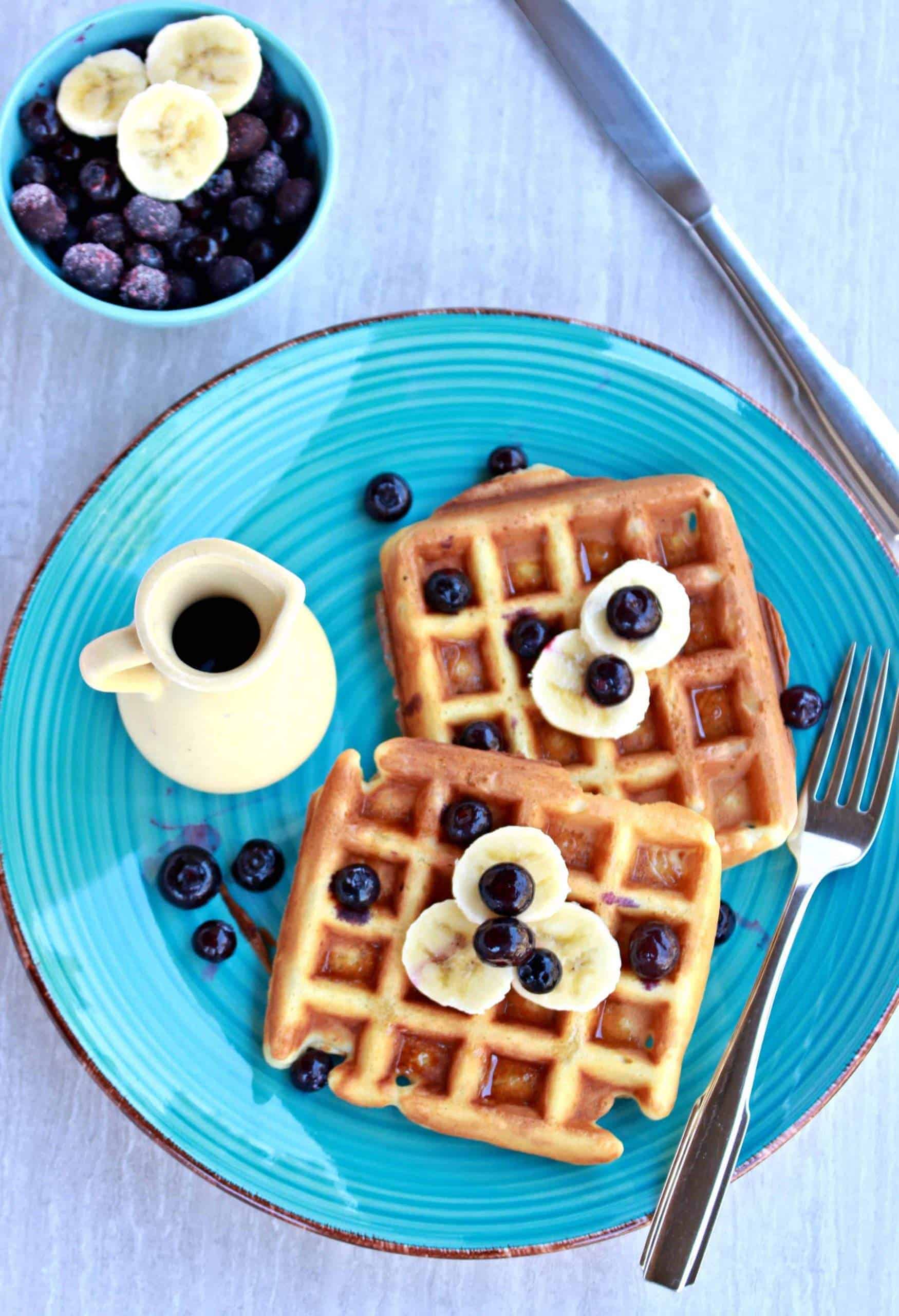Waffles with syrup and blueberries