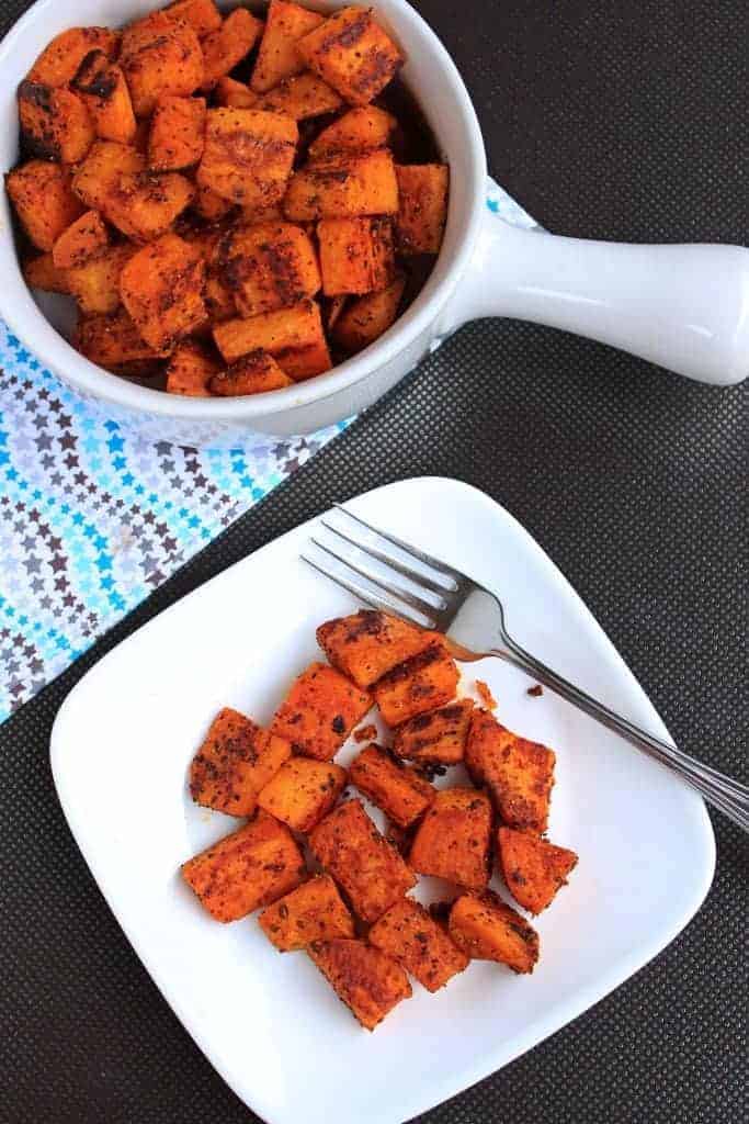 Ready to serve Spicy Oven Roasted Sweet Potatoes.