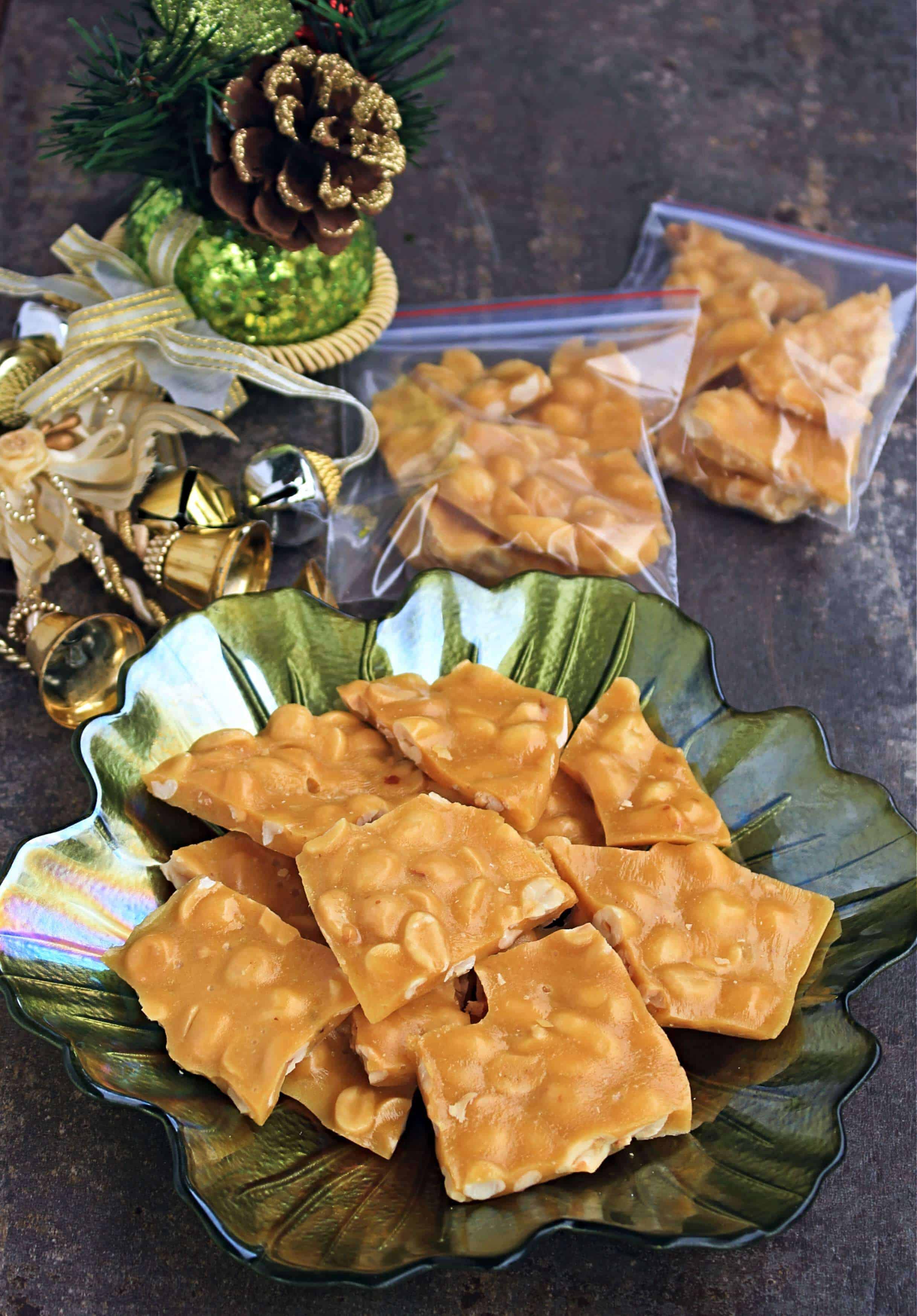 Old Fashioned Peanut Brittle pieces in a green plate