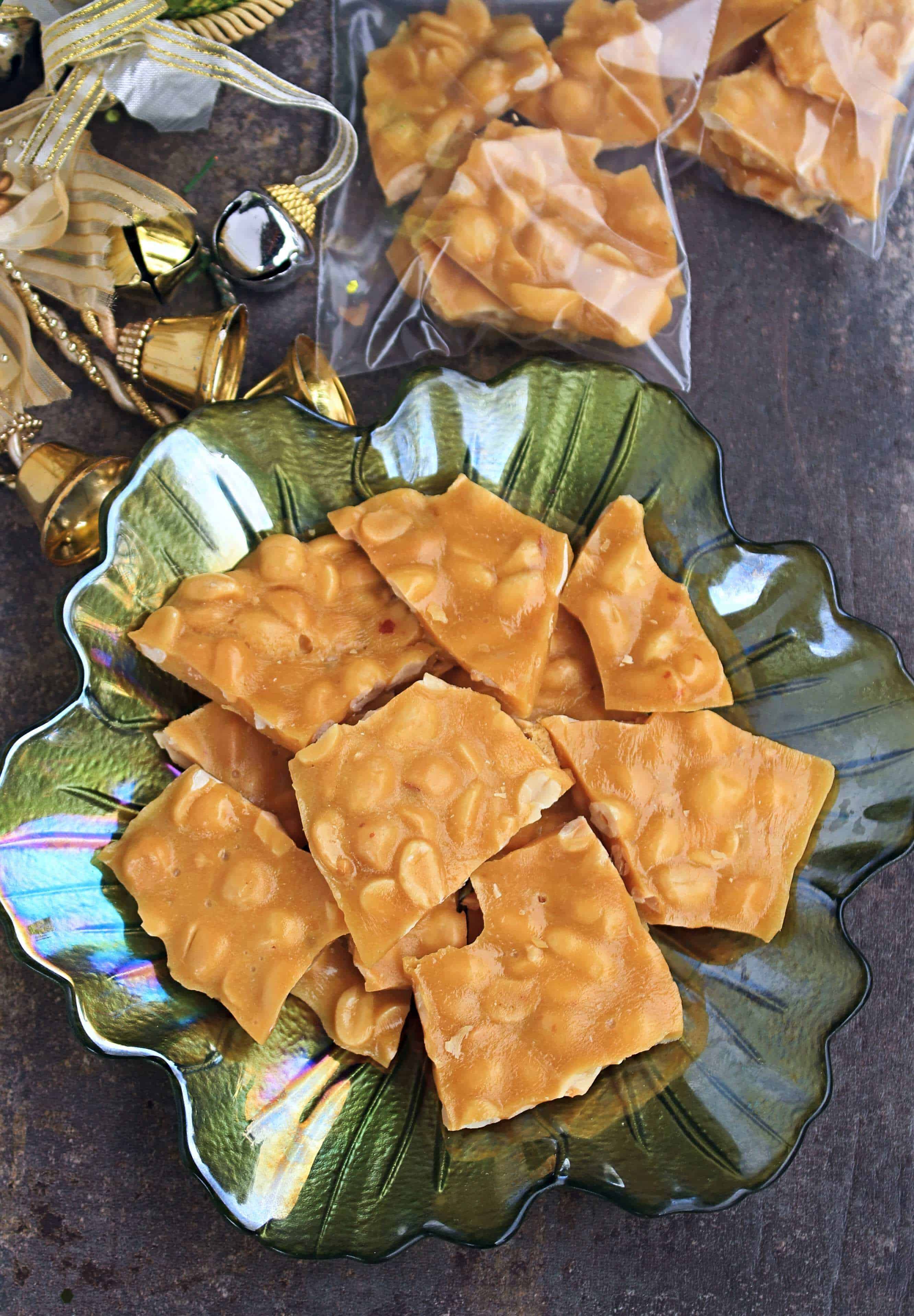 Old Fashioned Peanut Brittle in a decorative plate and some in zip locks