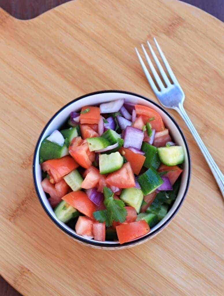 Kenyan Tomato and Onion Salad in a bowl