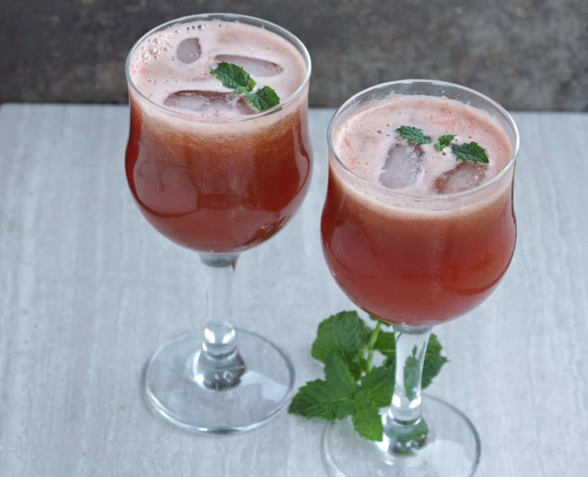 Spiced Watermelon and Mint Juice with mint as garnish