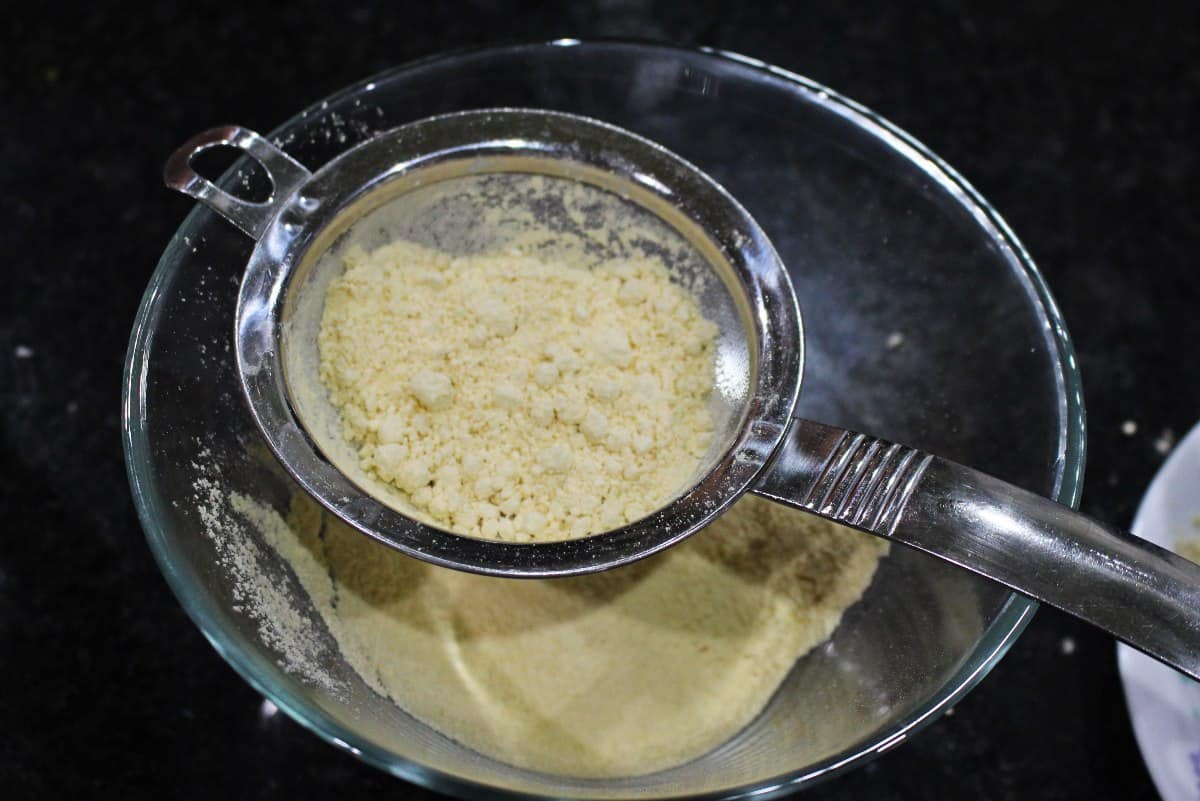 sieving the gram flour / chick pea flour