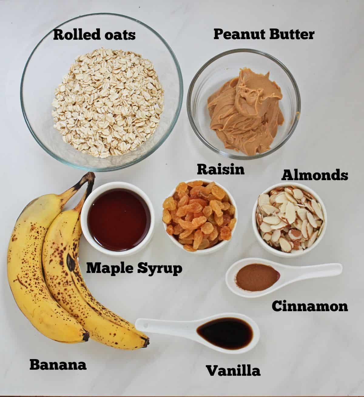 Ingredients needed to make banana oats bar laid out and labeled.