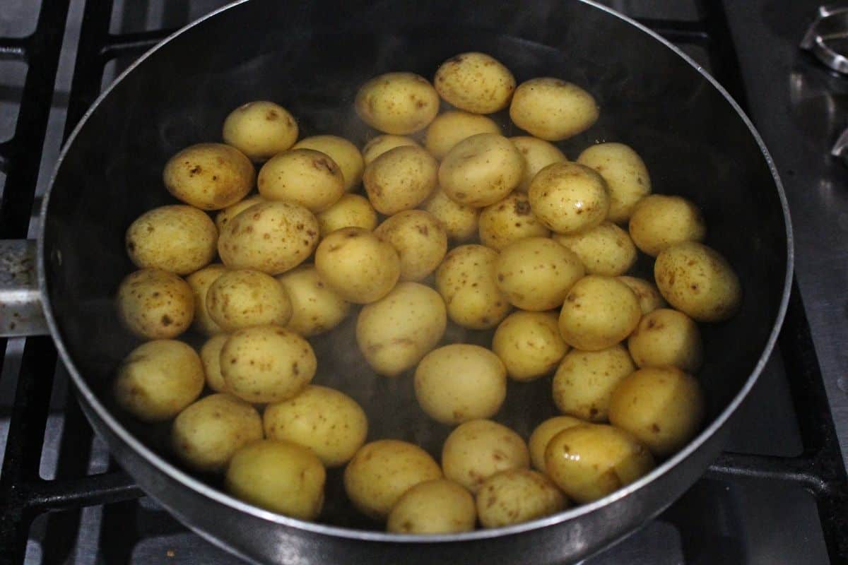 baby potatoes in pot of water