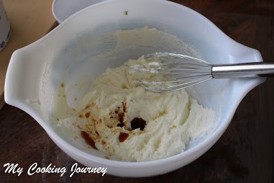 Adding vanilla extract in a bowl