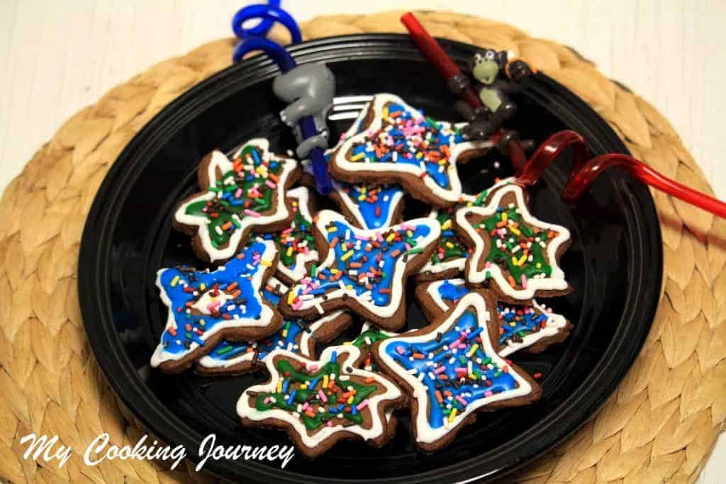 Iced Ginger Cookies in a black plate 
