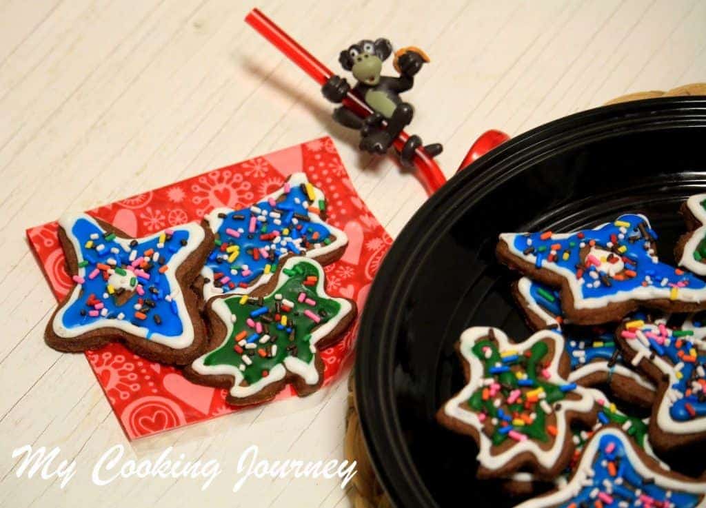 Star shape Iced Ginger Cookies with red monkey straw