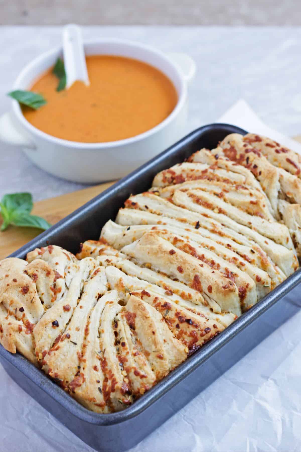 Pull apart herb bread with soup
