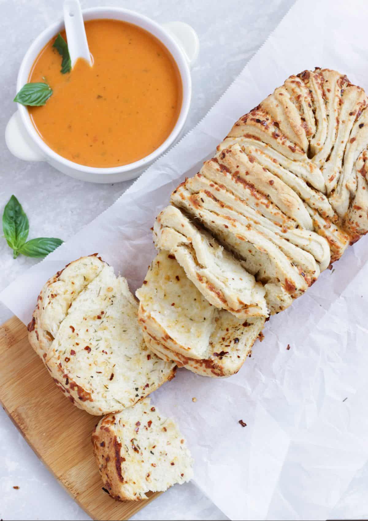 garlic herb and cheese pull apart bread served with soup