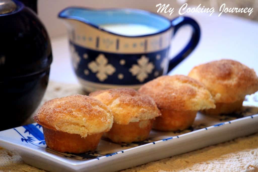 Cinnamon Sugar Muffins are served in a dish with milk