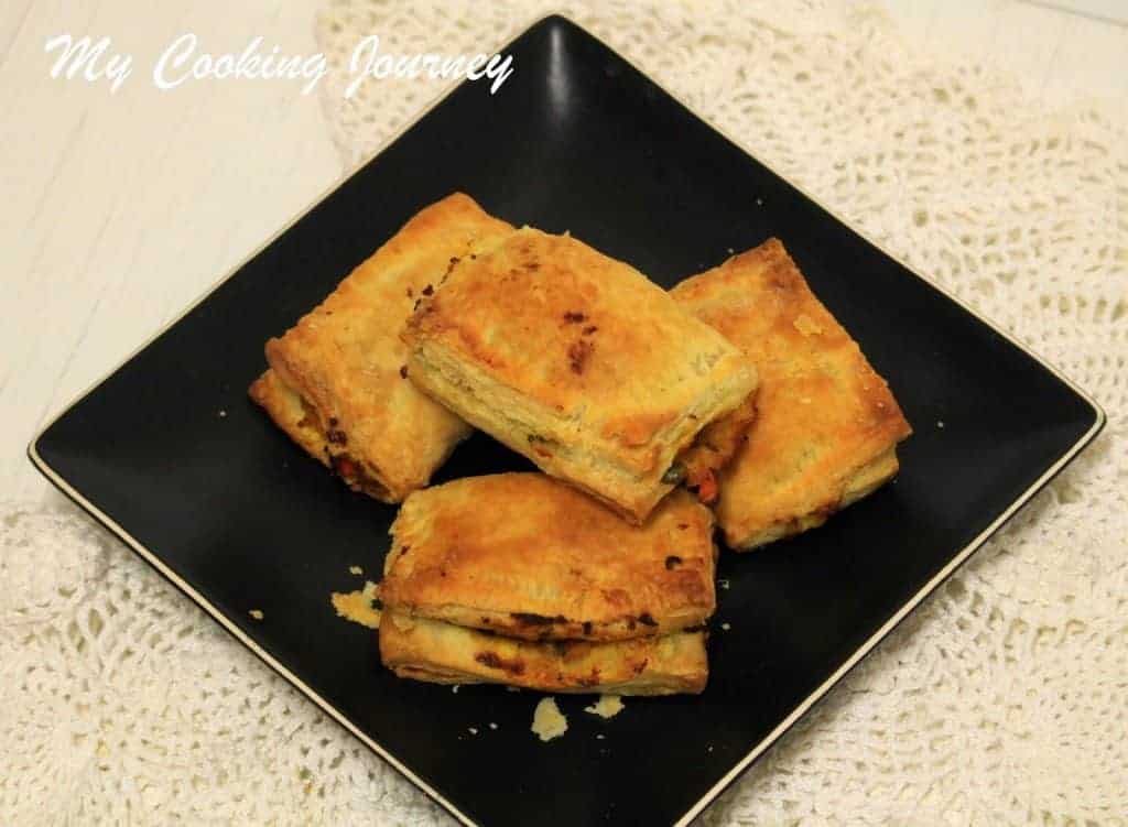 Vegetable Puffs in served in a black dish
