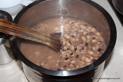 Boiling beans with water in a cooker