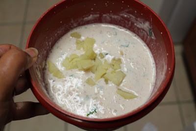 adding potato to the yogurt