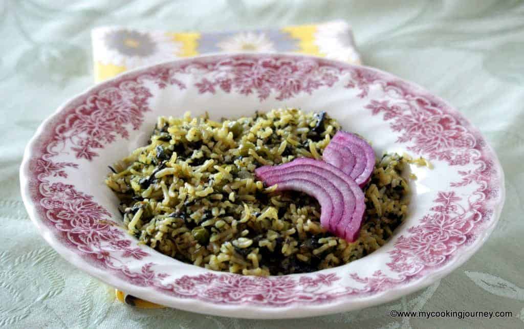 Palak Mutter Pulao – Spinach And Green Peas Pulao in a Plate