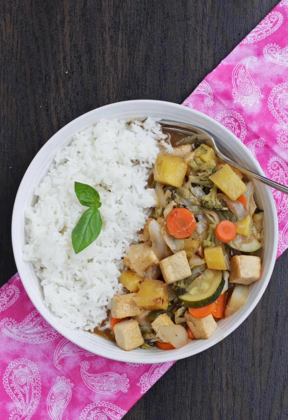 sweet and sour vegetables with tofu and served with rice